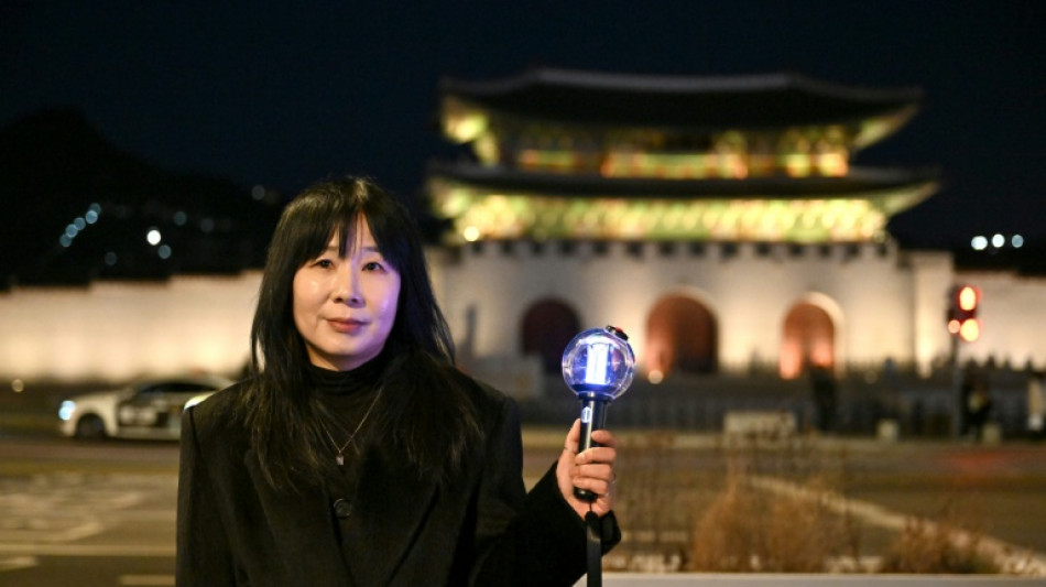  In Seoul square of protest and history, BTS fans welcome grand comeback 