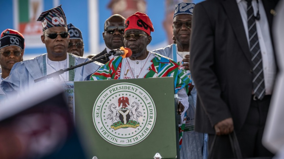  Nigeria's Tinubu defends record as economy bites ahead of election 