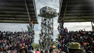 Huge crowds as body of revered Kenya politician Odinga heads home
