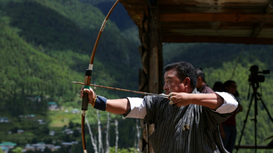  Bhutan's traditional archers lose ground to development 