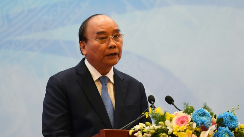 Vietnam parliament approves president's resignation