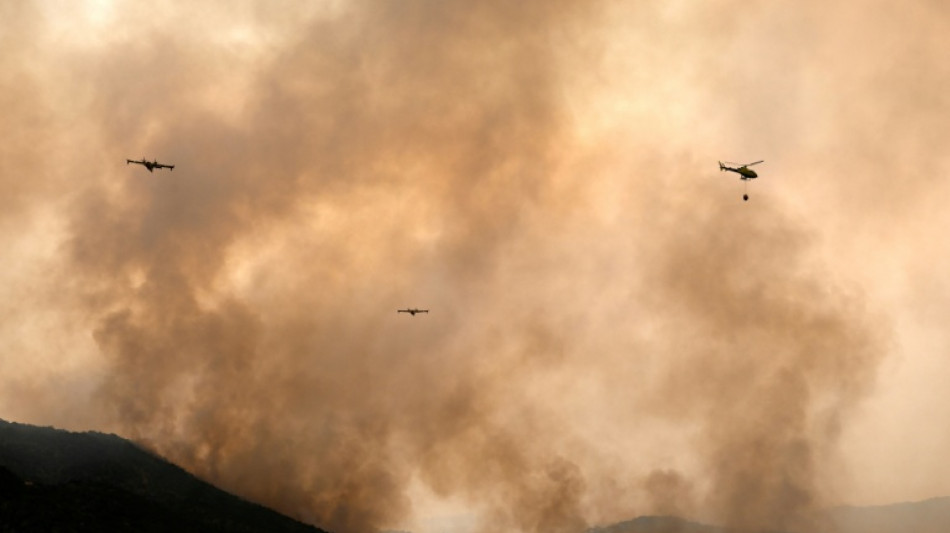  Spain allows wildfire evacuees to return but France fears flames spreading 