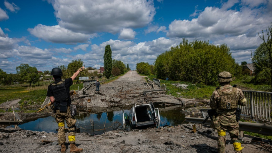 Fear and hope under fire in Ukrainian village near Russian border
