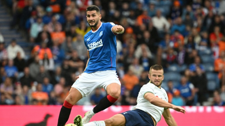 Rangers hit 10-man Hearts for four, Celtic made to sweat by Motherwell