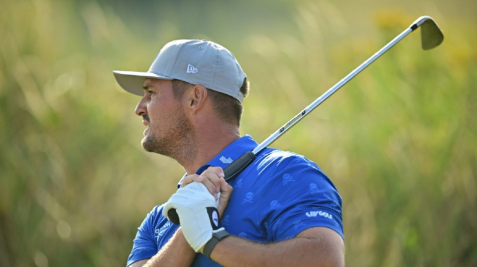  DeChambeau 'fired up' by two-shot penalty as Fox joins 62 club at British Open 
