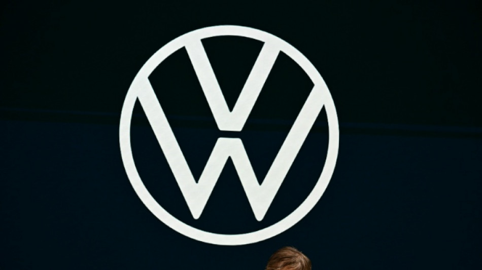 Volkswagen says to cut 50,000 jobs as profit slides
