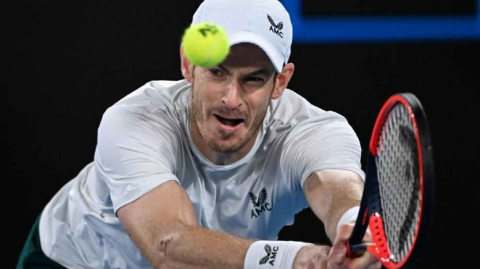 Murray wins Australian Open epic as Djokovic overcomes injury fear