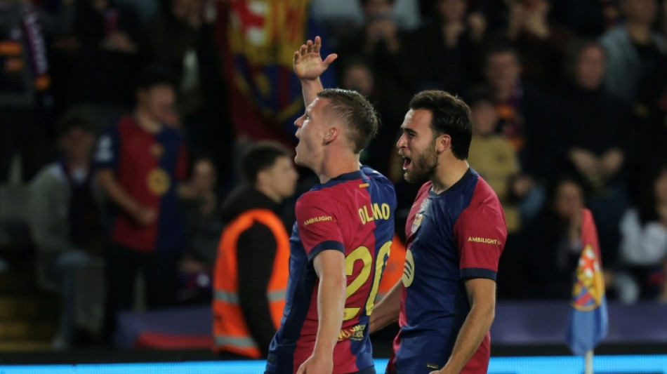 Olmo fires Liga leaders Barca past Mallorca