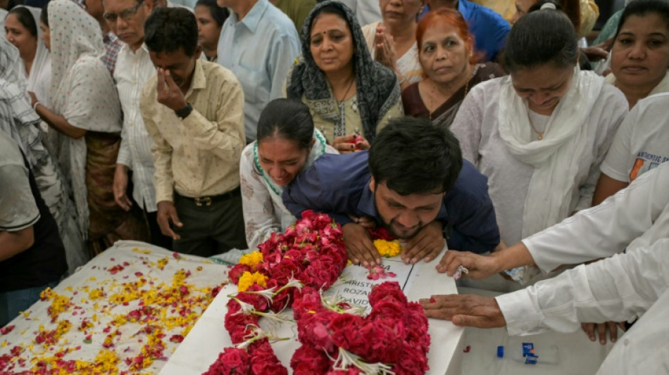 Relatives wait for remains after Air India crash