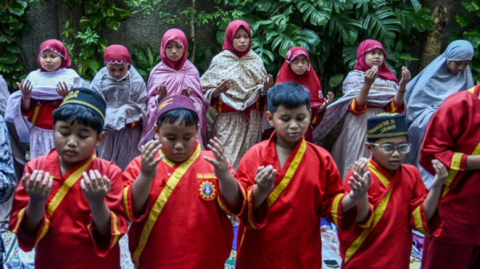  'Solution from the heavens': Indonesians pray for rain as fires burn 