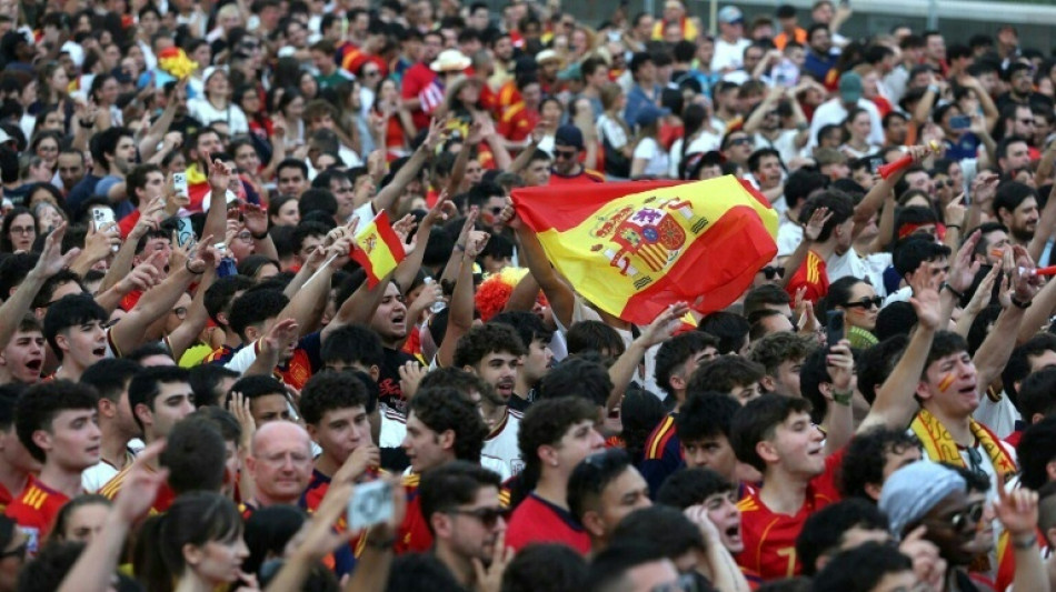  Red and yellow sweep Madrid before World Cup final 