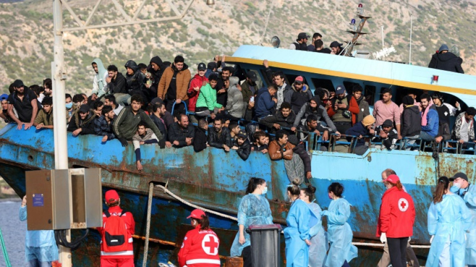 Migrant boat docks in Crete after dramatic rescue