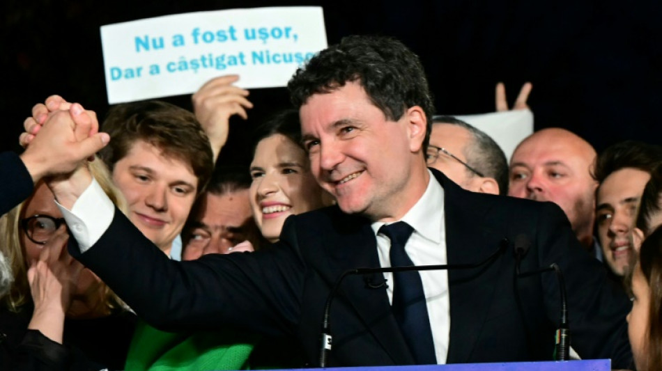 Pro-EU centrist wins tense Romania presidential vote rerun