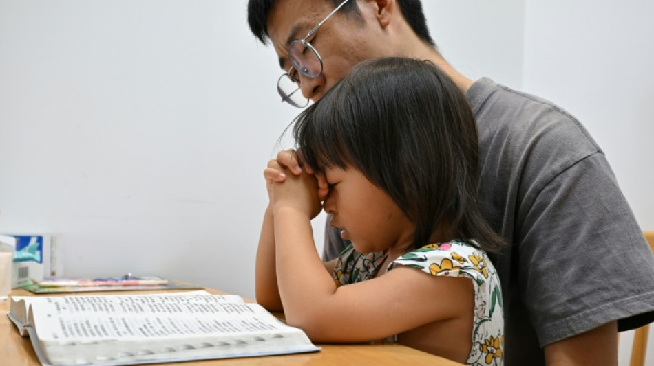 Families of detained Chinese Christians cling to faith in legal limbo 