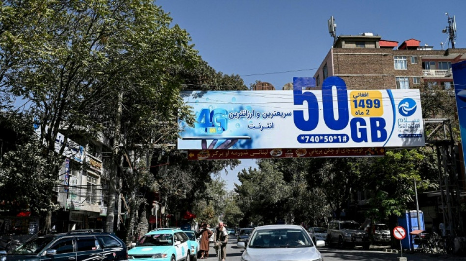 Mobile and data networks return across Afghanistan: AFP journalists