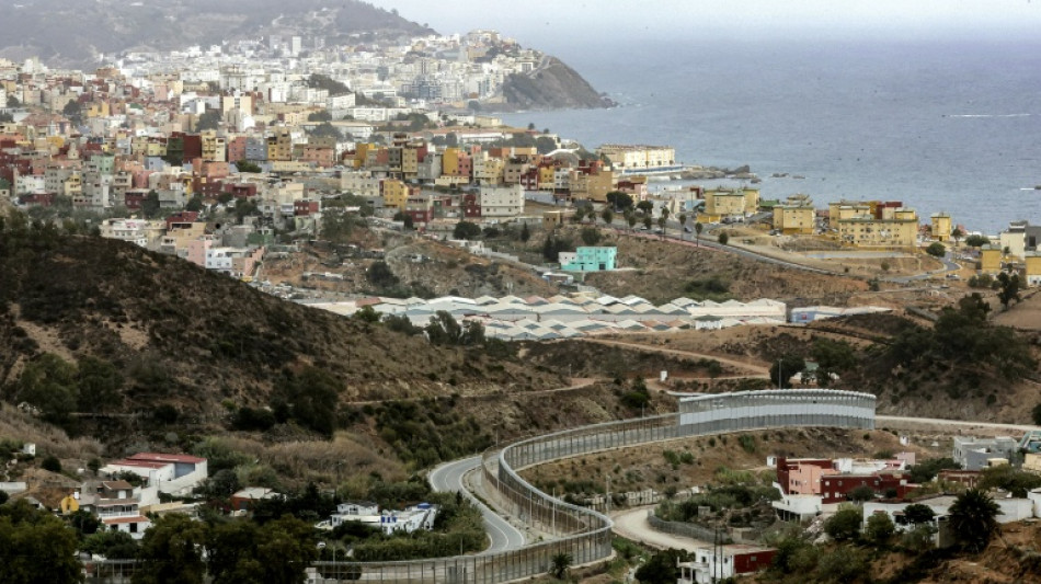  Hundreds of migrants swim to Spain's Ceuta territory from Morocco 