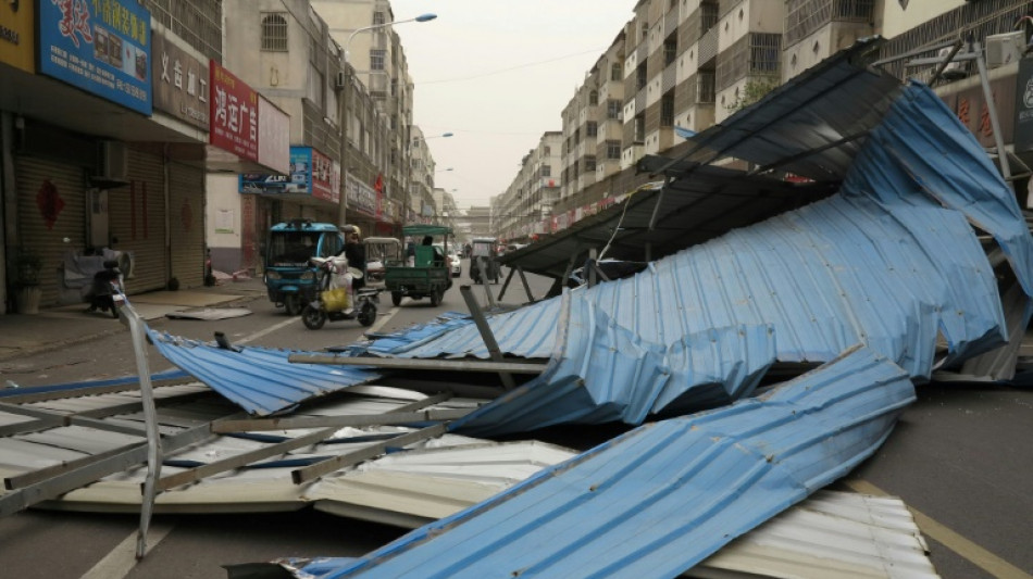Warnings issued, flights cancelled as strong winds whip north China