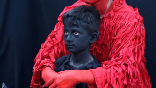 En Iran, guerriers et petits d&eacute;mons pour la f&ecirc;te chiite de l'Achoura