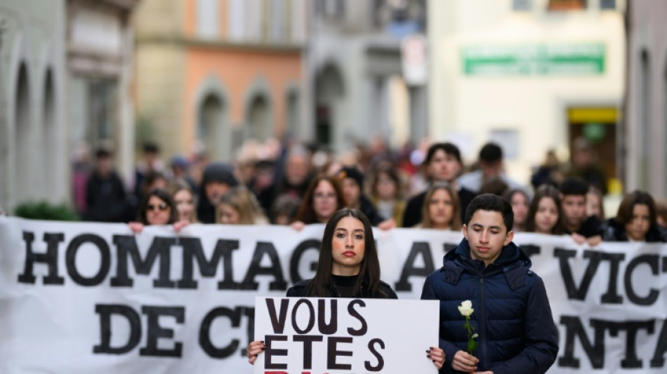 Protesters demand 'justice' one month after Swiss bar fire