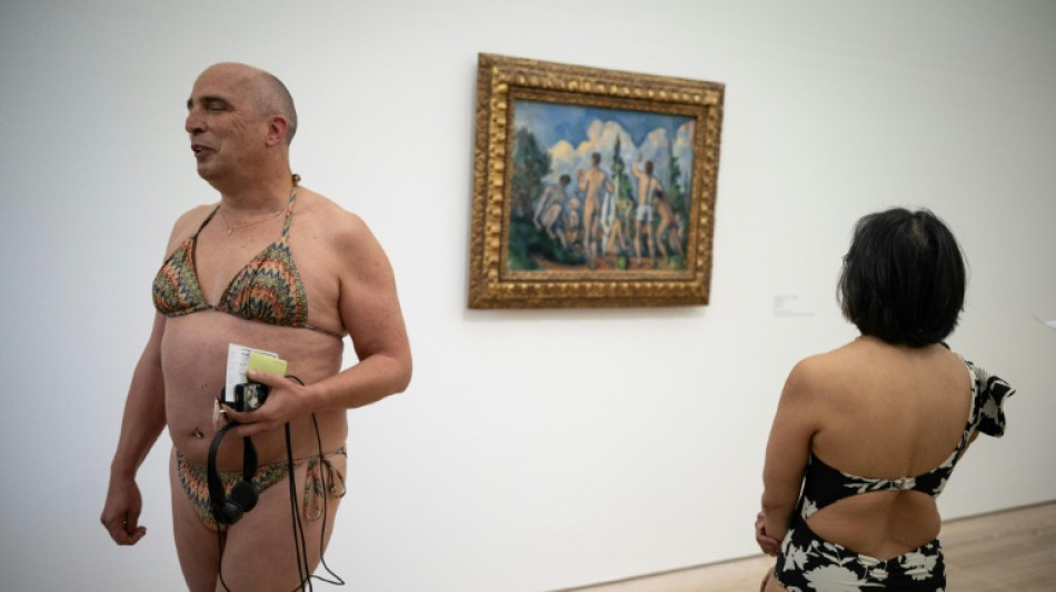  Immersive art: museum-goers in bikinis dive into Cezanne 