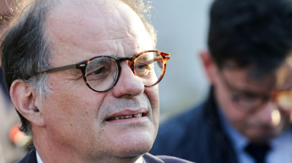  France's Macron taps ex-aide to head central bank 