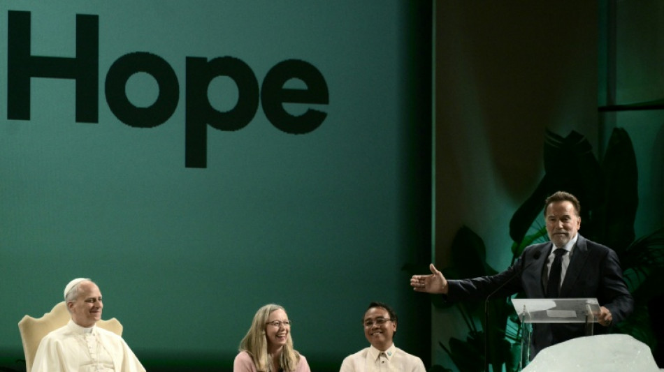 Schwarzenegger's 'action hero' pope says don't give up on climate change