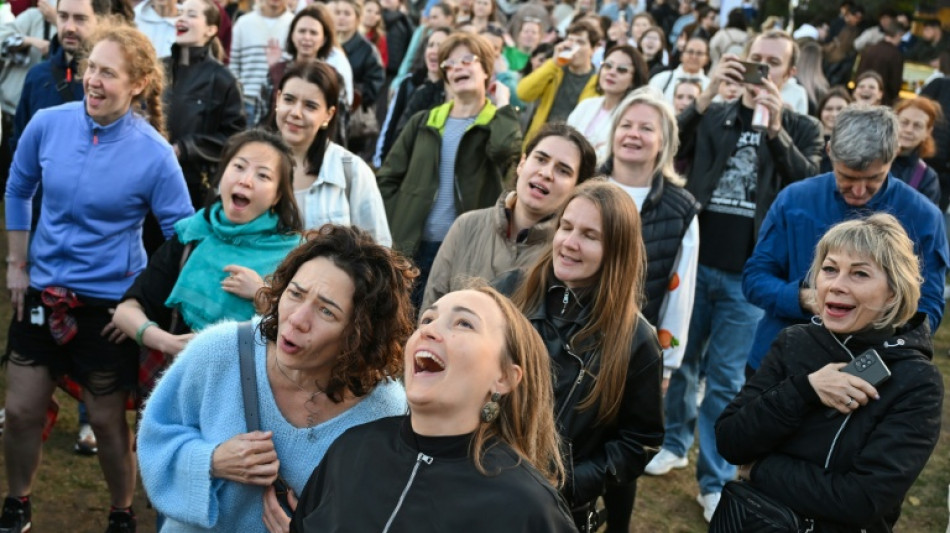  Russians join street choirs to sing away sorrows -- or show dissent 