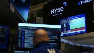 Wall Street termine en berne face aux tensions entre Trump et la Fed