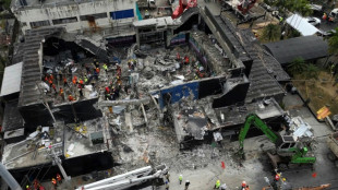 Why did a Dominican nightclub roof cave in? 