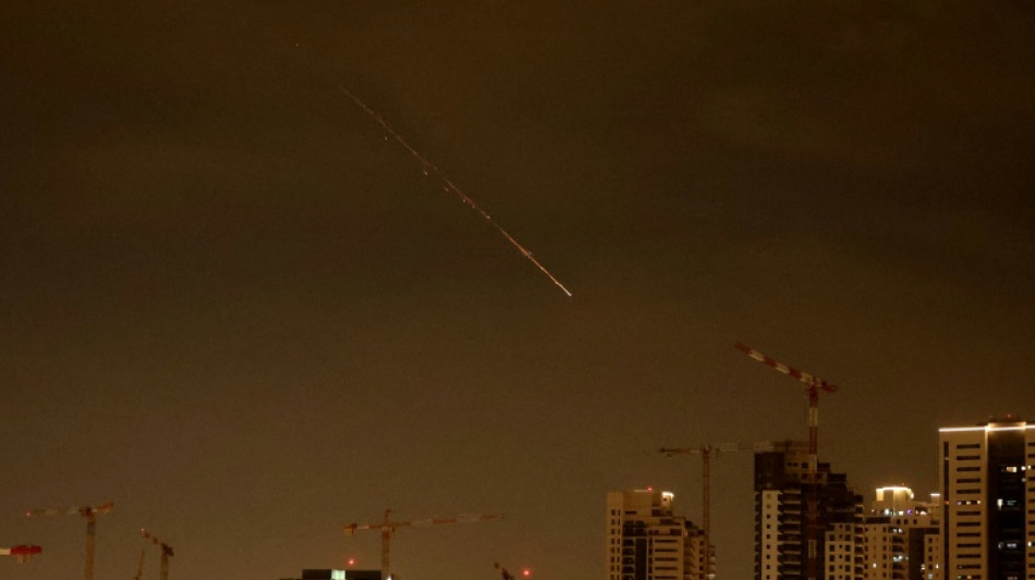 Iran fires missile salvo after Trump signals progress in talks