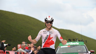 Tour d'Espagne: le Canadien Woods remporte la 13e &eacute;tape, Roglic revient sur O'Connor