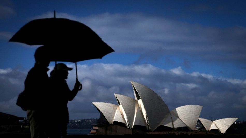  Australia to cut migration to fix housing crisis: minister 
