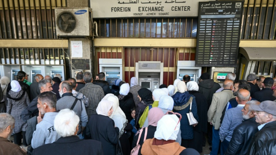 Cash crunch leaves Syrians queueing for hours to collect salaries
