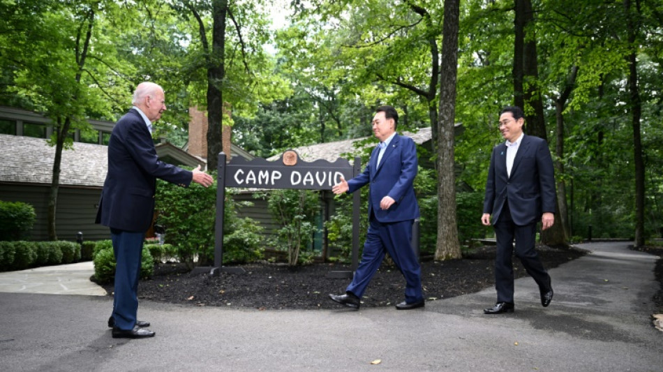 Biden salutes 'new era' of united Japan, S.Korea in face of China