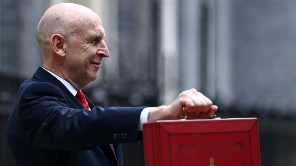  UK budget lifts bank tax to offset surging energy bills 