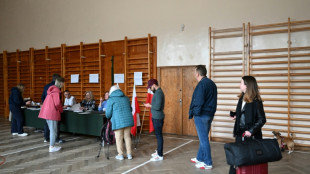 Poland holds tight vote with EU role at stake