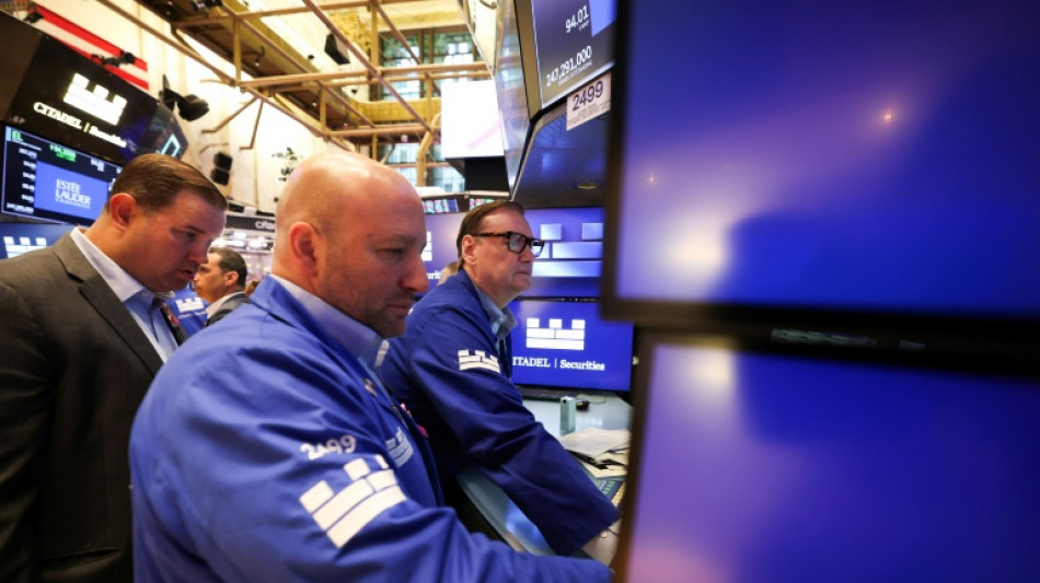  Wall Street cl&ocirc;ture en baisse, entre IA et r&eacute;sultats d'entreprises 