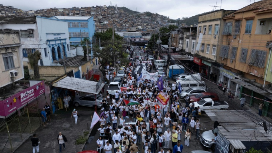 After the tears, anger on Rio's blood-stained streets