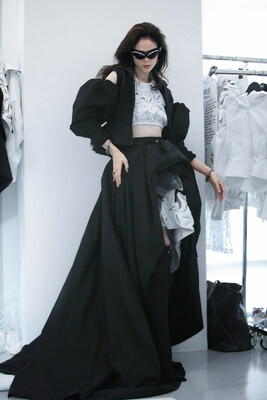 Coco Rocha poses backstage at the Bosideng SS24 runway show in Milan, Photo: Bosideng