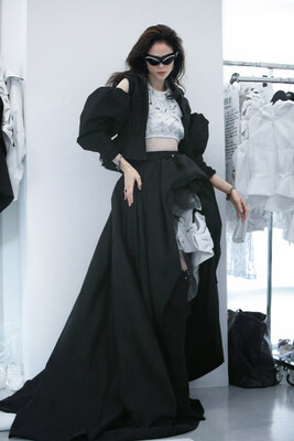 Coco Rocha poses backstage at the Bosideng SS24 runway show in Milan, Photo: Bosideng Coco Rocha poses backstage at the Bosideng SS24 runway show in Milan, Photo: Bosideng
